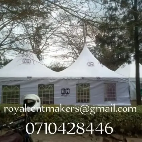 Twin-peak event tent with arched window panels