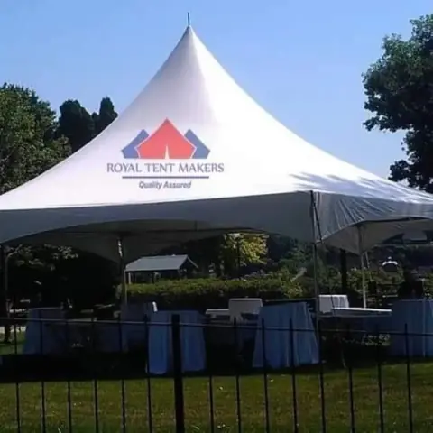 Royal Tent Makers branded high-peak marquee tent at an outdoor venue